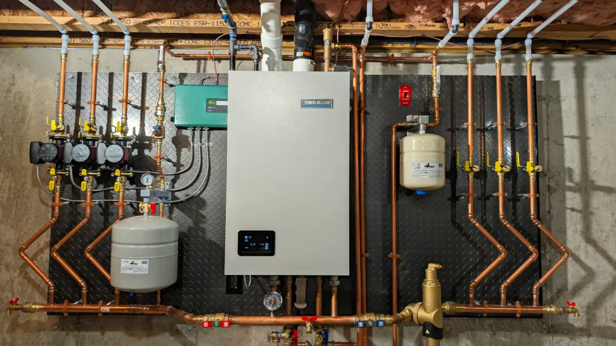 Photo of a Weil-McLain boiler installation completed by Jeneral Plumbing